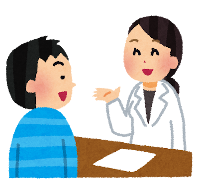 受付で会話する職員と利用者